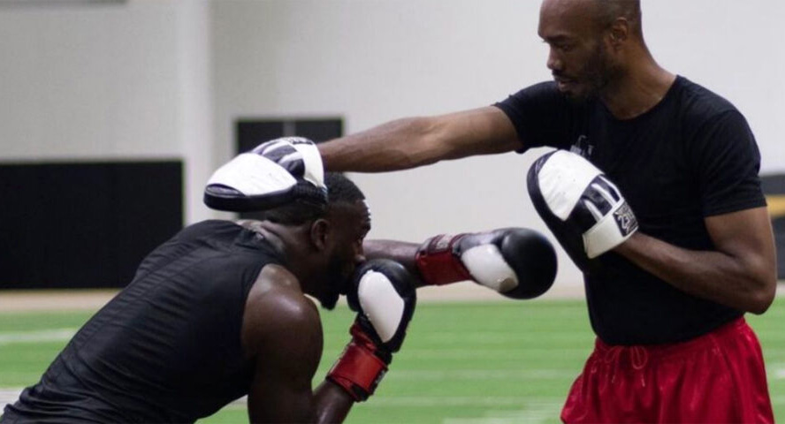 Jameson coaching private boxing padwork